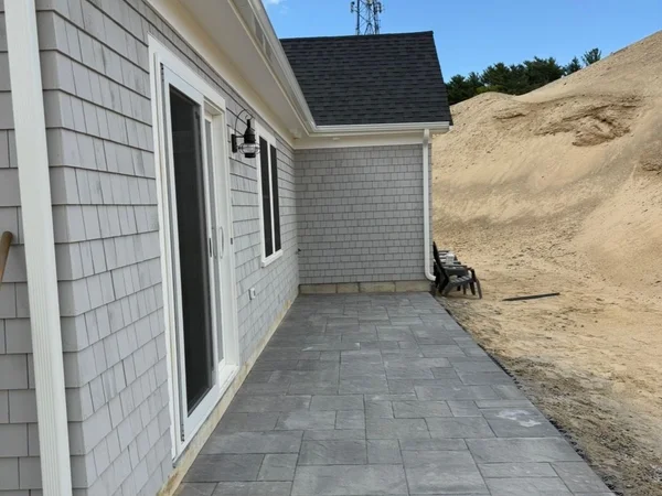 Beautiful paver patio installation by MAC Excavation & Landscape in South Shore MA
