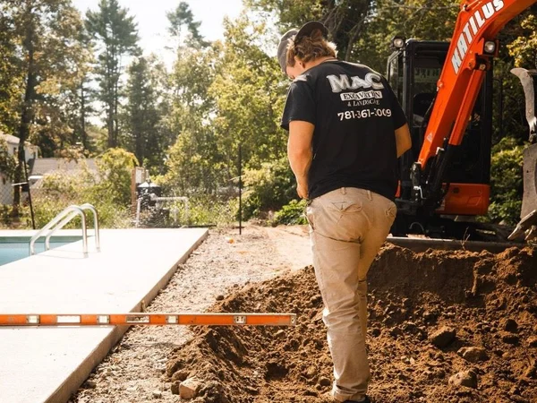 Pool area excavation and grading by MAC Excavation & Landscape in South Shore MA
