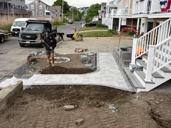Front Entry Paver Walkway — Marshfield, MA New front entry paver walkway and landing with charcoal border installed at a coastal Marshfield, MA home